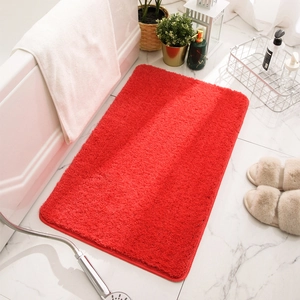Red plush non-slip bathroom mat made of high-density long-pile fiber for home comfort
