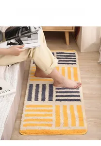 Macro view showing the soft tufted texture of this geometric pattern kitchen floor mat