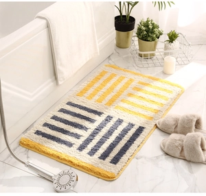 Close-up of thick plush surface of a non-slip bathroom mat with geometric patterns