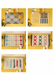 Detailed view of absorbent bathroom rugs with various geometric art patterns and soft texture