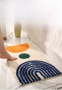 Macro detail of geometric bath mat with soft absorbent fibers and non-slip backing