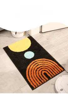 Macro detail of minimalist rectangular entryway mat with plush colorful geometric patterns