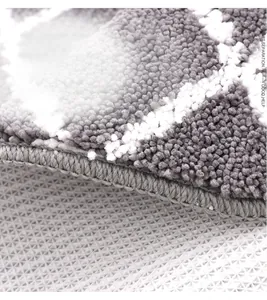 Detail view of thickened geometric bath mat with anti-slip rubber backing and high pile