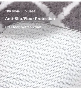 Detail of white TPR non-slip backing with diamond texture for bathroom floor mats