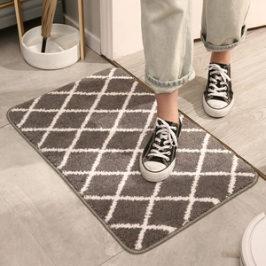Thickened gray diamond pattern plush door mat for entryway on light wooden floor