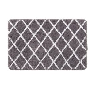 Absorbent grey bathroom rug with white geometric lattice pattern and non-slip backing
