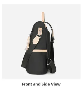 Side view of black nylon backpack with brown leather accents and silver hardware