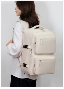 Close-up of business travel backpack with multi-layer pockets and side buckle detail