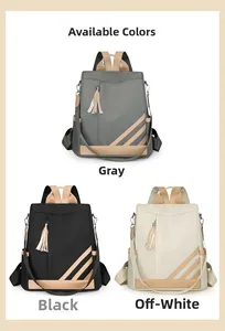 Contrast PU leather women backpack in grey black and beige with tassel detail