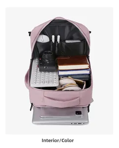 Vista dettagliata dell'interno dello zaino rosa con scomparti organizzati per laptop