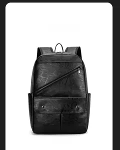 Detailed front view of black PU leather business backpack with stylish zippers and texture