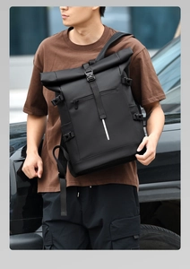 Detail of waterproof roll-top backpack with reflective strip and functional buckles