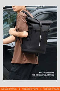 Detail of waterproof roll-top backpack with reflective safety strip for travel