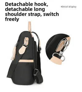 Detail display of the detachable shoulder strap with metal hooks on the nylon backpack