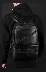 Macro shot of durable black PU leather texture and premium metal hardware on business backpack