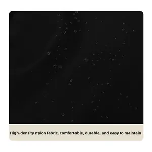 Close-up of waterproof high-density nylon fabric showing water droplets on backpack
