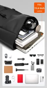 Detail of roll-top backpack storage showing large capacity for 15.6 inch laptop