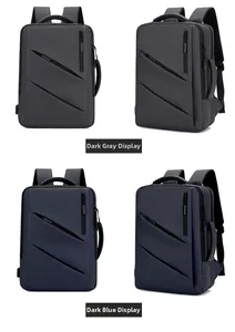 Dettaglio di grandi zaini business grigio e blu con porta di ricarica USB sul lato