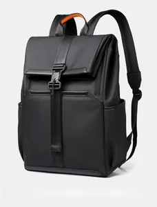 Side view of black business travel backpack showing water-resistant fabric and orange handle