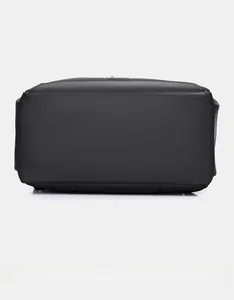 Detail view of the durable matte black rectangular bottom of the large commuter backpack
