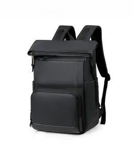 Side view of black insulated waterproof backpack with roll-top and front zipper pocket