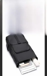 Detailed view of spacious interior compartments for laptop and digital accessories