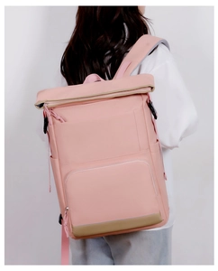 Pink insulated picnic backpack with roll-top closure and large capacity for camping use