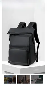 Black insulated cooler backpack with roll-top zipper and breathable mesh straps for hiking