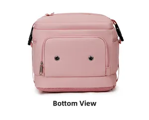 Pink nylon backpack detail showing bottom shoe compartment and breathable mesh layer