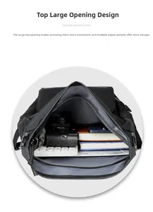 Macro view of large top opening and interior storage compartments of black thermal backpack