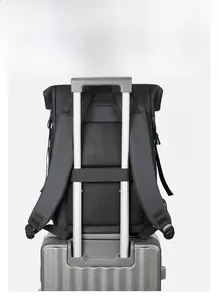 Detail of insulated backpack featuring waterproof fabric and luggage trolley sleeve