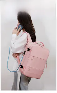 Detailed side view of pink waterproof nylon travel backpack with adjustable side buckle straps