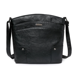 Detail of vintage black PU leather bag with multi-layer design and silver metal rivets