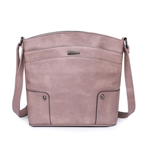 Detailed close-up of pink PU leather handbag featuring geometric metal buckle and studs