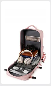Pink travel backpack with 180-degree box opening and multiple storage compartments