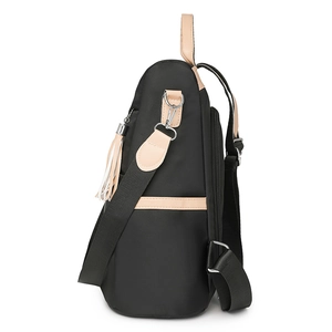 Women's large nylon backpack in black and brown with tassel and adjustable straps