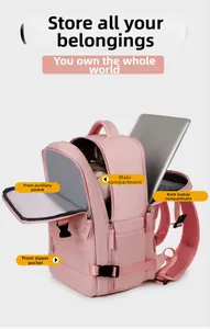Pink travel backpack showing organized compartments for laptop and large storage space