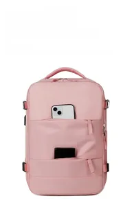Detailed view of pink nylon backpack featuring multi-layer storage pockets for gadgets