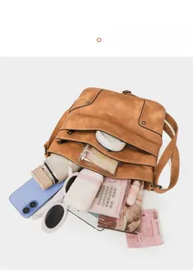 Top view of brown vintage PU leather bag showing large capacity for daily essentials