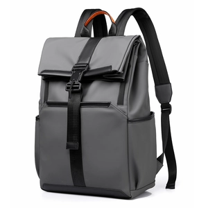 Minimalist grey waterproof business backpack with roll-top closure and orange accents