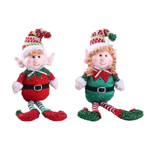 Christmas elf plush dolls with striped long legs and sequin hats on white background