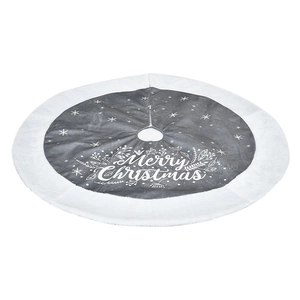 Close-up of grey Christmas tree skirt with Merry Christmas text and white plush trim