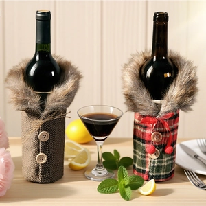 Detailed view of Christmas wine bottle covers with fur collars and plaid wool fabric