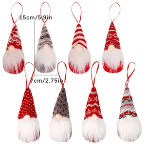 Set of 8 knitted Christmas gnome ornaments with white beards and festive patterns for hanging