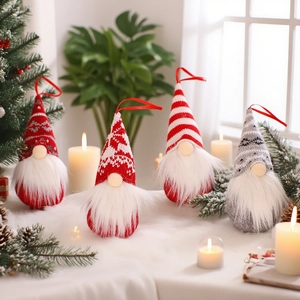 Set of 4 knitted Christmas gnomes with hanging strings for tree decoration in red and gray