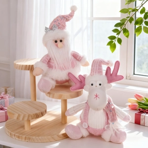Pink and white plush Santa and reindeer Christmas ornaments with sequins on wooden stand