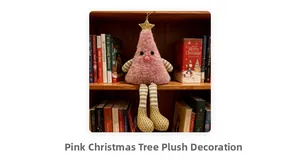 Pink plush Christmas tree figurine with gold star and striped legs on a bookshelf