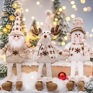 Detailed view of sitting Santa, Reindeer and Snowman plush trio with knit texture