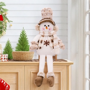 Detail of Christmas snowman plush doll with long legs in cozy brown plaid winter attire