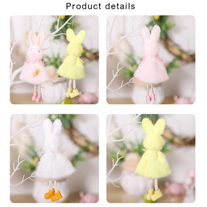 Detail of plush Easter bunny pendants in pink, yellow, and white with soft fabric textures
